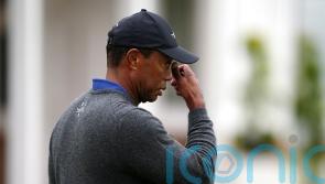 Tiger Woods cuts frustrated figure after 79 leaves him fighting to make Open cut
