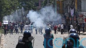 Bangladesh security forces fire bullets and sound grenades as protests escalate
