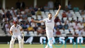 England lose three late wickets after Gus Atkinson helps peg back West Indies