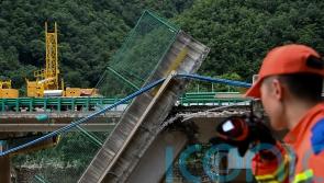 Death toll from China bridge collapse raised to 38 as two dozen still missing
