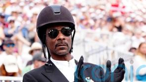 Snoop Dogg wears equestrian kit as he watches dressage at Paris Olympics