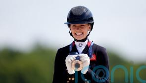 Charlotte Fry celebrates adding individual bronze to team triumph