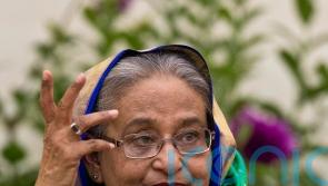 Bangladeshi PM resigns and leaves country amid widening unrest