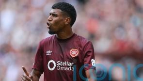 Dundee coast to victory over Hearts to go top of fledgling table