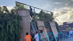 Crowds boo as sixth Banksy artwork of cat removed hours after being unveiled