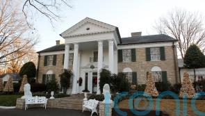 Woman charged with bid to defraud Elvis Presley’s family through Graceland sale