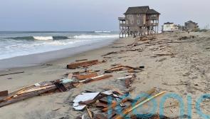 Storm Ernesto gains strength as a hurricane over open Atlantic
