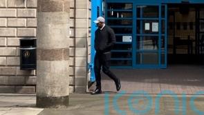 Ex-firefighter admits taking photo of dead man at scene of crash