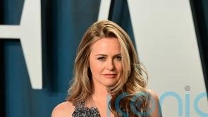 Alicia Silverstone is &lsquo;alive and well&rsquo; after appearing to eat harmful plant