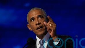 Obamas share warnings about Trump amid rousing Harris endorsements