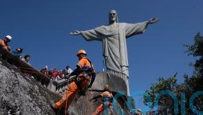 Rio de Janeiro climbers clean site of Christ the Redeemer statue