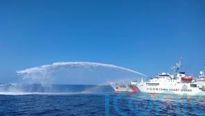 Chinese ship fires water cannons at Philippine vessel in disputed sea area