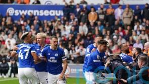 Callum Robinson’s late equaliser earns Cardiff a point in derby at Swansea