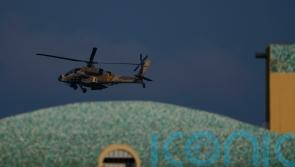 Israeli air strikes target Lebanon as Hezbollah fires rockets to avenge killing