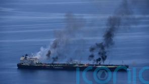 Greek-flagged tanker burning after Houthi attacks, but no sign of oil spill