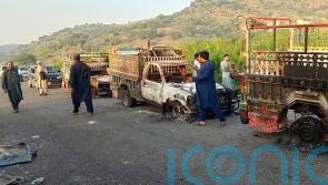 Gunmen kill at least 31 people in two separate attacks in south-western Pakistan