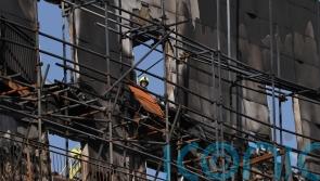 Far too much dangerous cladding on buildings, says deputy PM in fire scene visit