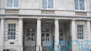 Teenager appears in court accused of shouting racist abuse on top of phone box