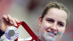 Daphne Schrager tells of ‘surreal’ moment Jackie Chan presented her silver medal