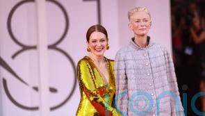 Tilda Swinton and Julianne Moore embrace longest standing ovation at Venice