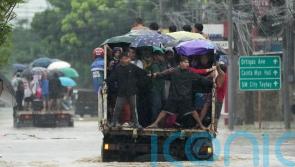 Tropical storm leaves at least 14 dead in the Philippines