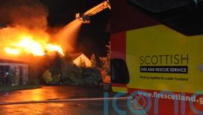 Crews still in attendance at fire-hit residential building