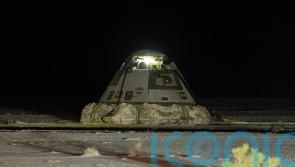 Boeing’s troubled space capsule lands on Earth without astronauts