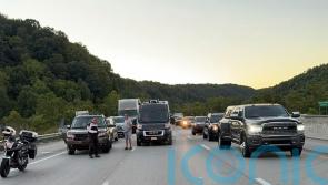 Authorities search for gunman after up to seven people hurt on Kentucky highway