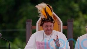 Pope arrives in remote Papua New Guinea jungle with humanitarian aid and toys