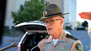 Kentucky police search for gunman after five wounded on busy highway