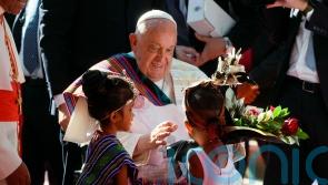 Crowds flock to Pope Francis’ seaside mass in East Timor