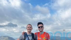 Blind lawyer and boss complete 24 peaks in 24 hours raising £140,000 for charity