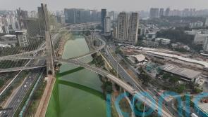 Sao Paulo river turns emerald green as drought continues