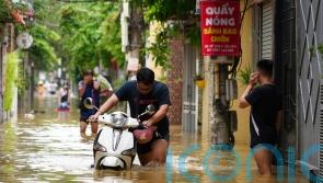 Death toll in Vietnam close to 200 after typhoon