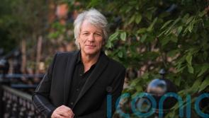 Jon Bon Jovi helps talk woman down from ledge on bridge