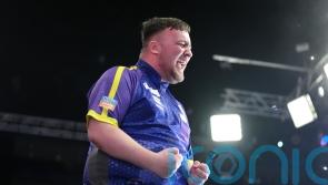 Luke Littler beats Michael Smith to win World Series of Darts Finals