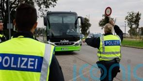 Germany begins conducting checks at all its land borders