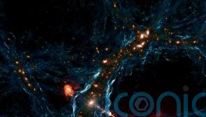 Record-breaking black hole jets discovered in faraway galaxy