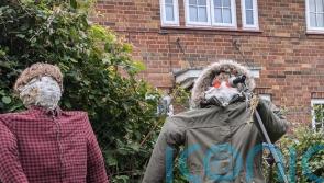 Oasis recreated in straw form as part of Cambridgeshire scarecrow festival