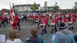 Orangemen parade passes by Ardoyne without incident as residents stage protest
