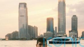 Scots-Australian athlete beats record for swimming around Manhattan