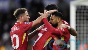 Liverpool go top of the Premier League after win at Wolves