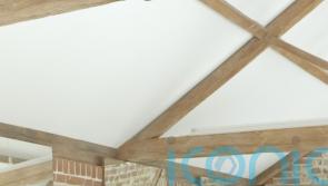 British designer &lsquo;over the moon&rsquo; after long-lost coat found in charity shop