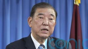 Japan’s likely next leader says he will call election for October 27