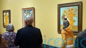 Eco-activists pour soup over Van Gogh paintings again hours after others jailed
