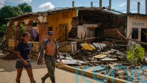 Hurricane John flooding leaves 17 dead, villages devastated in Mexico