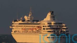 Luxury liner lingers off Northern Ireland coast two days after leaving harbour
