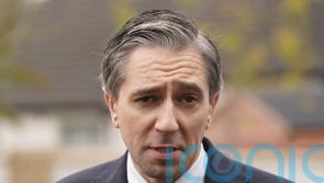 Taoiseach accuses Sinn Fein of ‘hypocrisy’ over opposition to phone pouch scheme