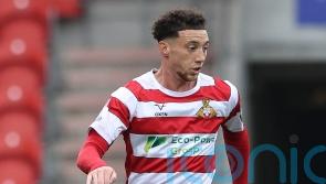 Jordan Gibson’s brace helps Doncaster to victory at 10-man Grimsby