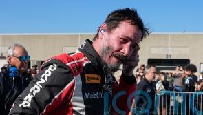 Keanu Reeves spins off track in professional racing car debut